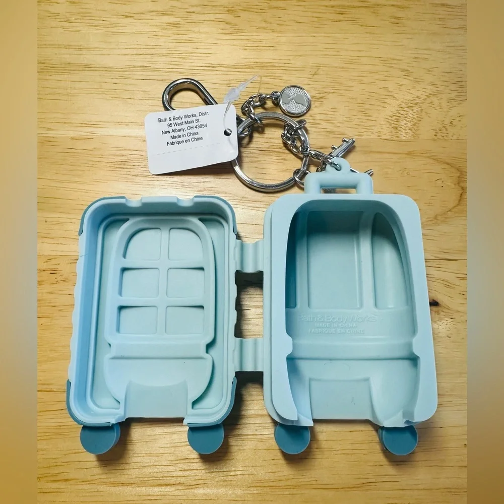 Suitcase Silicone hand sanitizer holder Keychain Charm in Light Blue